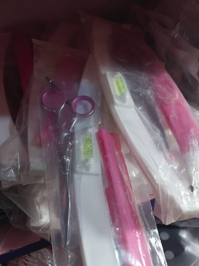 Hair shear with meter rule